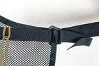 Close on the webbing tab, G-hook and paracord lacing at one corner