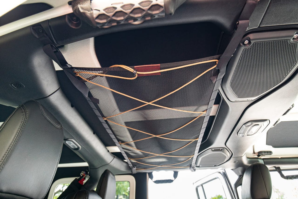 The JLU attic from the side, strapped to the roll bar