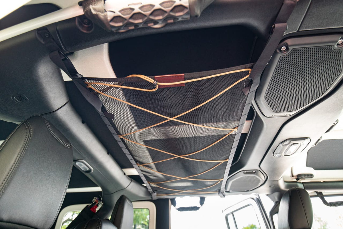 The JLU attic from the side, strapped to the roll bar