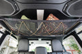 The JLU attic loaded with soft gear under the hardtop of a four-door Wrangler