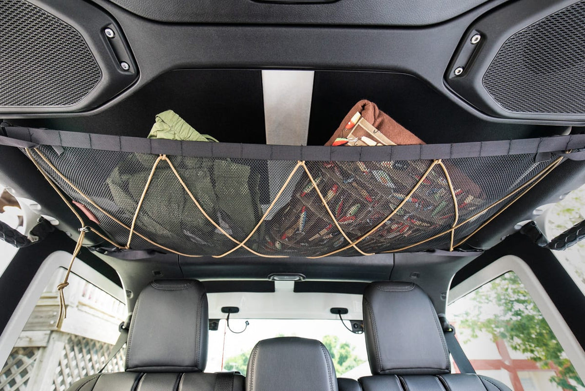 The JLU attic loaded with soft gear under the hardtop of a four-door Wrangler