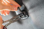 Prying the cover off a Tacoma garment hook