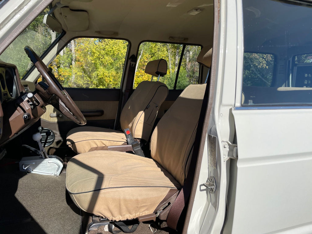 Escape Gear canvas seat covers, Land Cruiser 60 Series, Light Khaki front seats, wider view through the open door