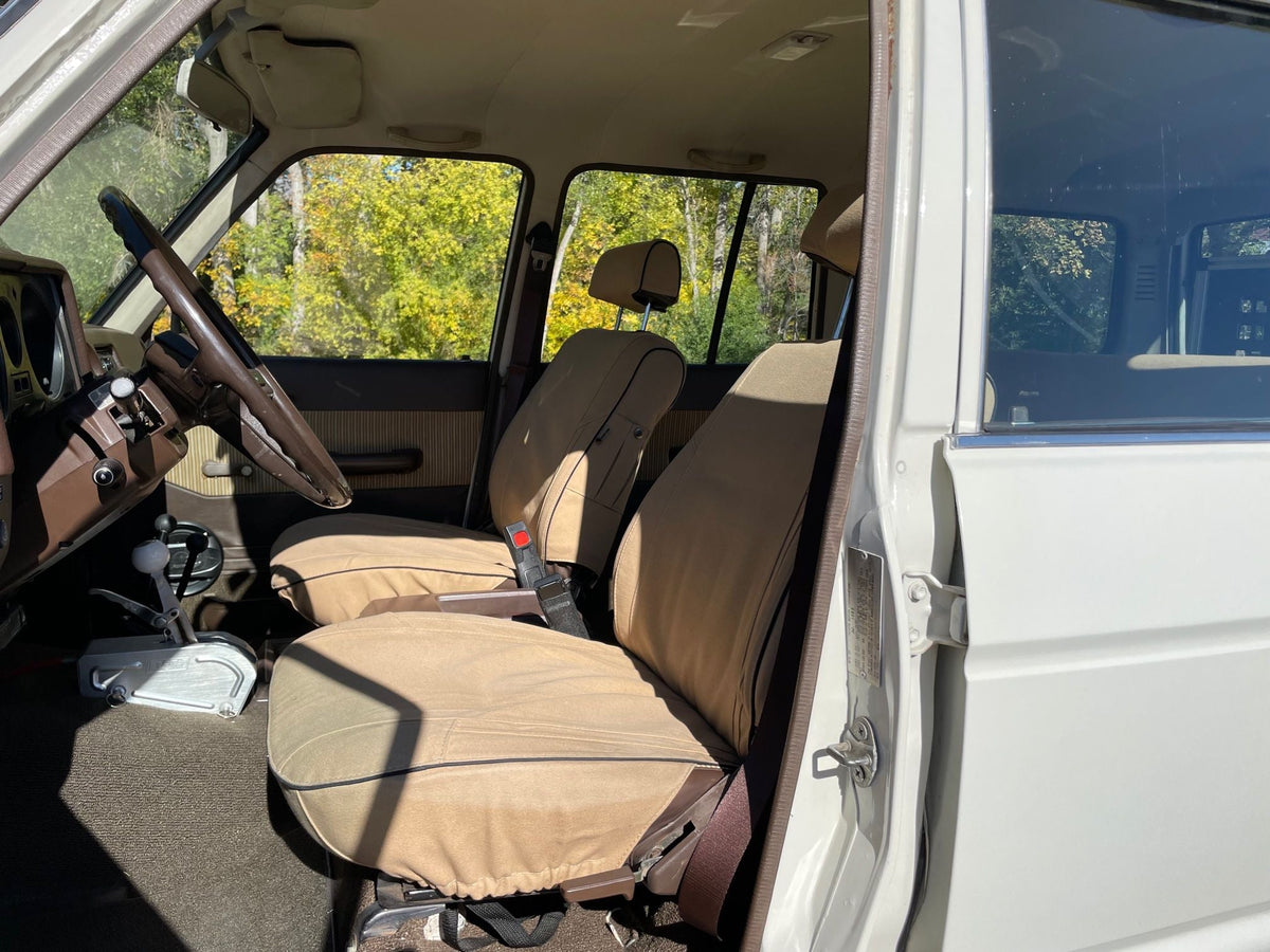 Escape Gear canvas seat covers, Land Cruiser 60 Series, Light Khaki front seats, wider view through the open door