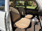 Escape Gear canvas seat covers, Land Cruiser 60 Series, Light Khaki front seats, side view from the open door