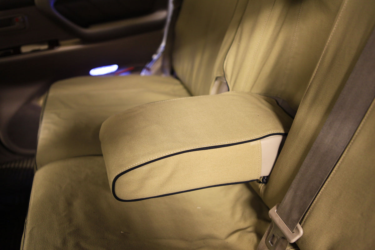Escape Gear canvas seat covers, Land Cruiser 100 Series, Light Khaki rear fold-down armrest cover with black piping
