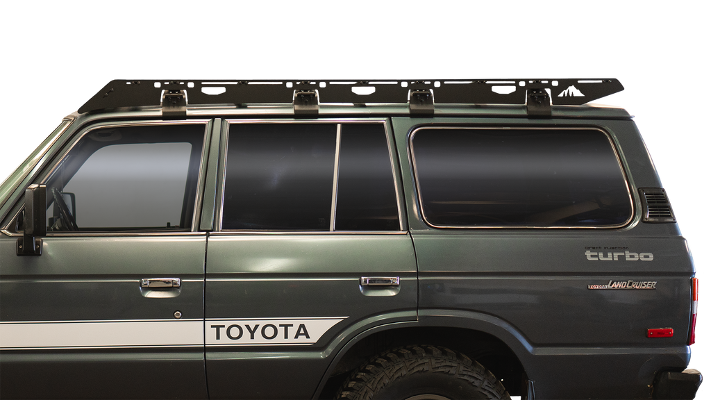 Sherpa Mineral roof rack on a gray 60 Series Land Cruiser turbo, close side view on black