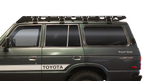 Sherpa Mineral roof rack on a gray 60 Series Land Cruiser turbo, close side view on black