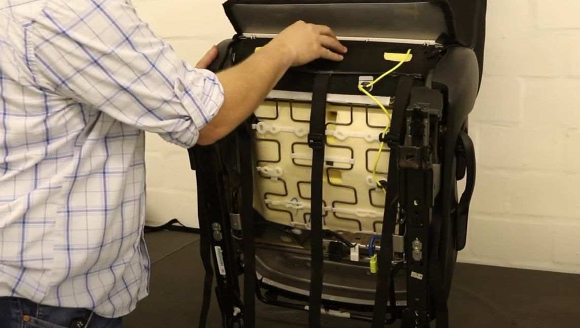Escape Gear canvas seat covers, Land Cruiser 200 Series (2016 to 2021), cover being fitted over a removed seat back