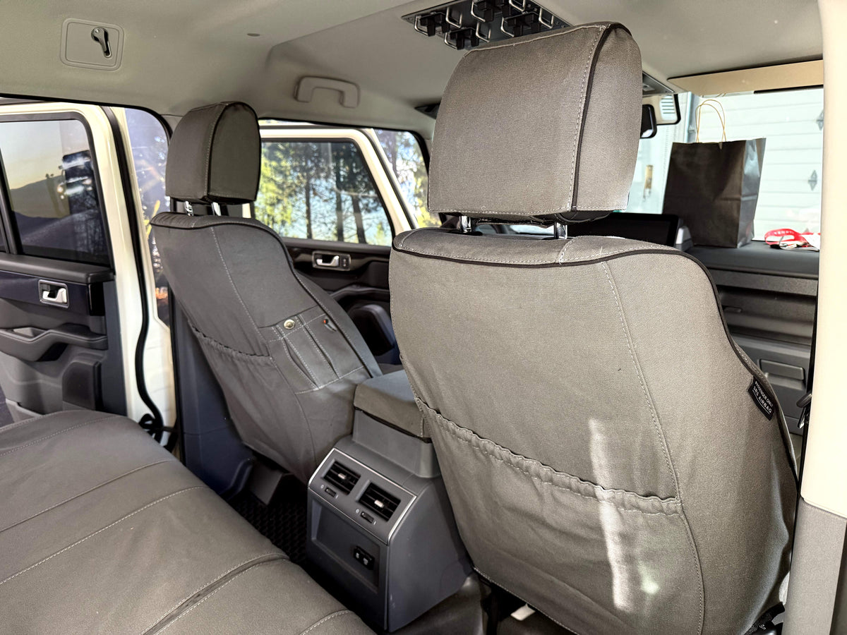 Escape Gear canvas seat covers, Ineos Grenadier, Grey front seat backs with rear pockets, from the back seat