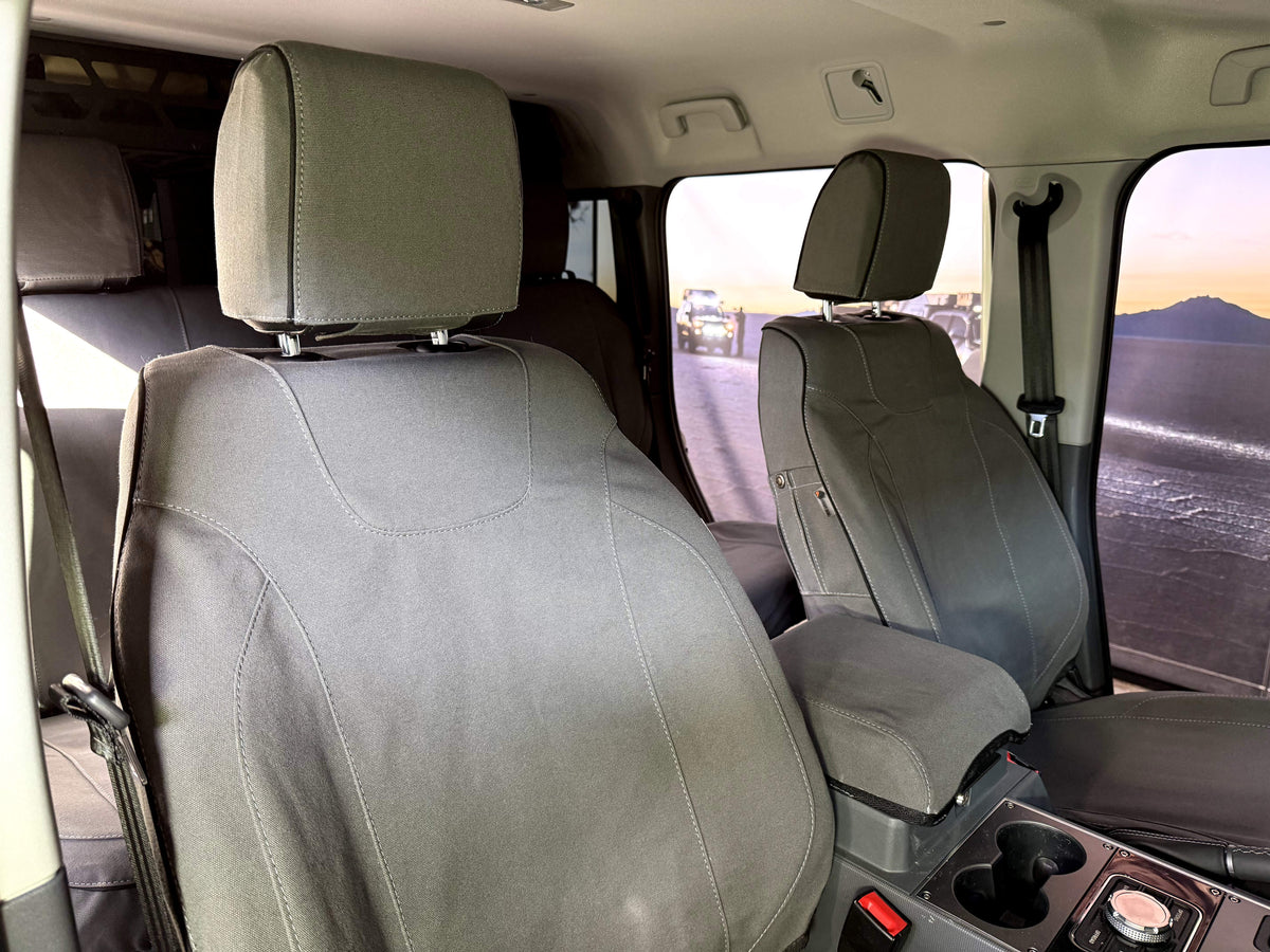 Escape Gear canvas seat covers, Ineos Grenadier, Grey front seats and armrest cover, interior view