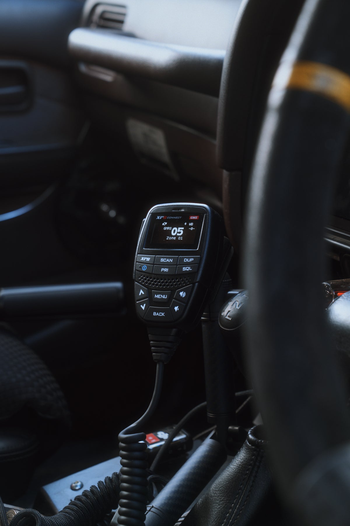 The XRS Connect mic clipped in the cab of our 80 Series, beside the steering wheel