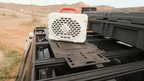 Adapt Plate across Sherpa crossbars carrying a speaker