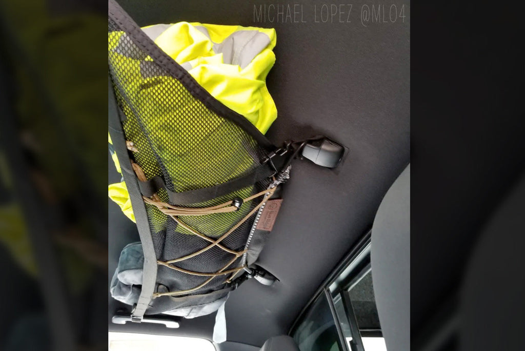 Close on a hi-vis jacket in the Tacoma attic mesh