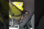 Close on a hi-vis jacket in the Tacoma attic mesh