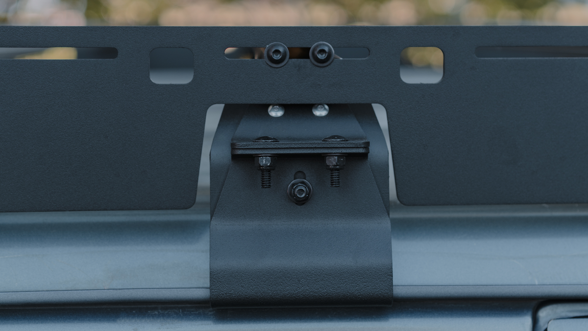 Mineral steel gutter mount bolted through the sideplate, close-up