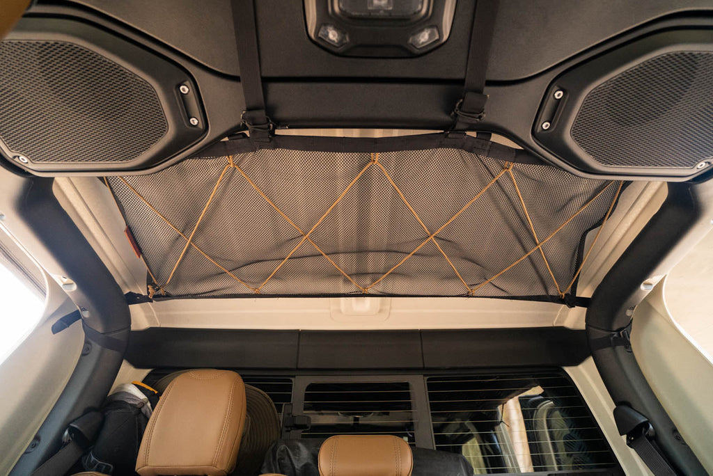 The Gladiator attic under the hardtop, mesh laced flat