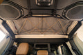 The Gladiator attic under the hardtop, mesh laced flat