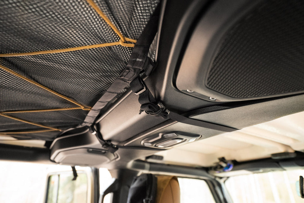 The Gladiator attic seen from the rear seat, laced up with paracord