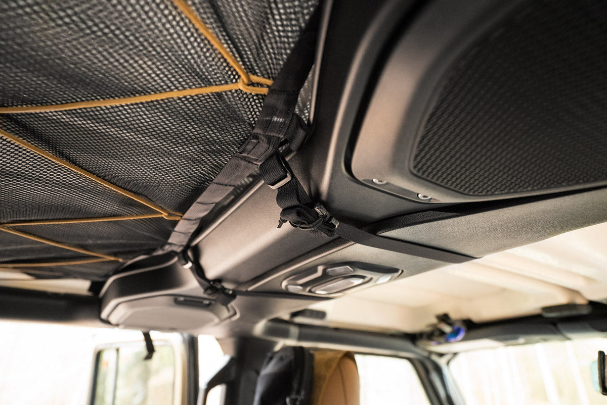 The Gladiator attic seen from the rear seat, laced up with paracord