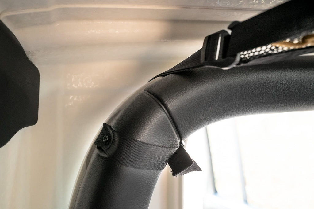 Close on a Gladiator attic buckle at the roll bar