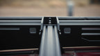Sherpa awning mount on a crossbar, seen from the side of the rack