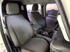 Escape Gear canvas seat covers, Ineos Grenadier, Grey front seats and console through the open door