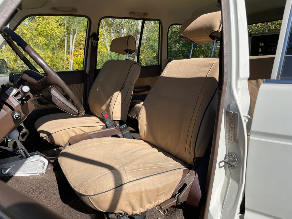 Escape Gear canvas seat covers, Land Cruiser 60 Series, front seats in Light Khaki through the open passenger door