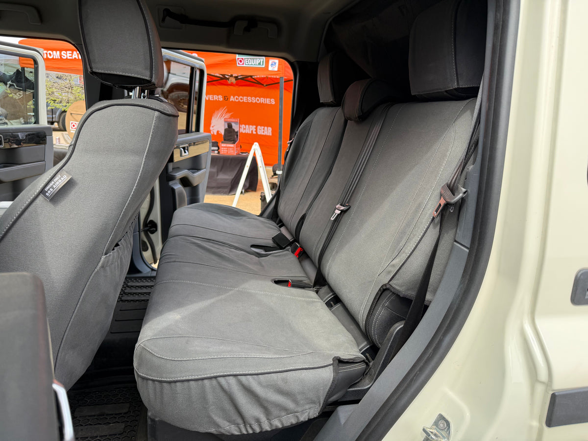 Escape Gear canvas seat covers, Ineos Grenadier, Grey rear bench seat through the open rear door