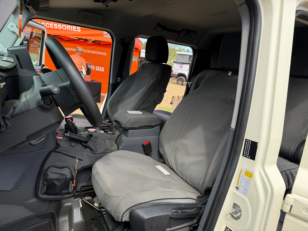Escape Gear canvas seat covers, Ineos Grenadier, Grey front seats and console cover through the open door