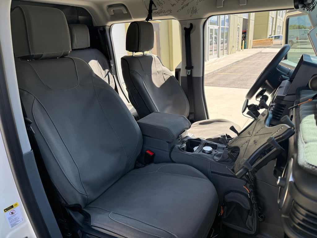 Escape Gear canvas seat covers, Ineos Grenadier, Grey front seats, side view through the open door