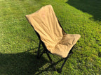 Eezi-Awn K9 Fold A Chair in Beige on grass, three-quarter view from above