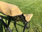 Eezi-Awn K9 Fold A Chair, close-up of the Beige canvas sleeve over the black frame