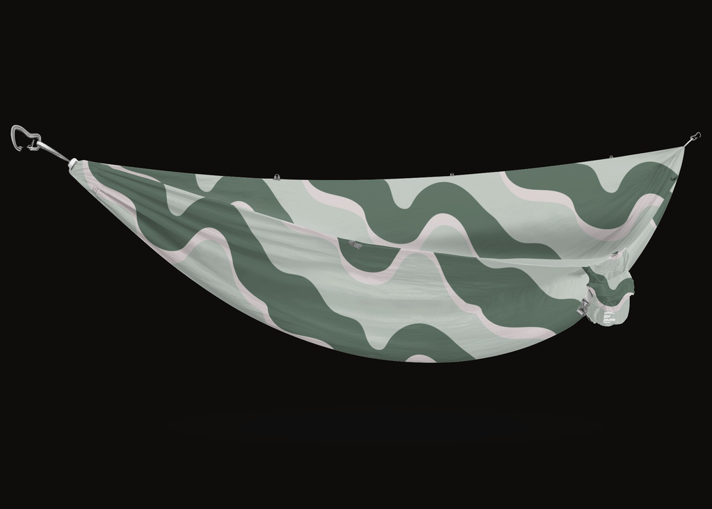 The Roo Double Printed hammock in the Waves print, carabiners at each end