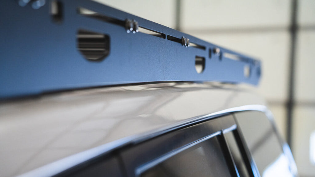 Oxford sideplate cutouts and hardware along a 100 Series roof
