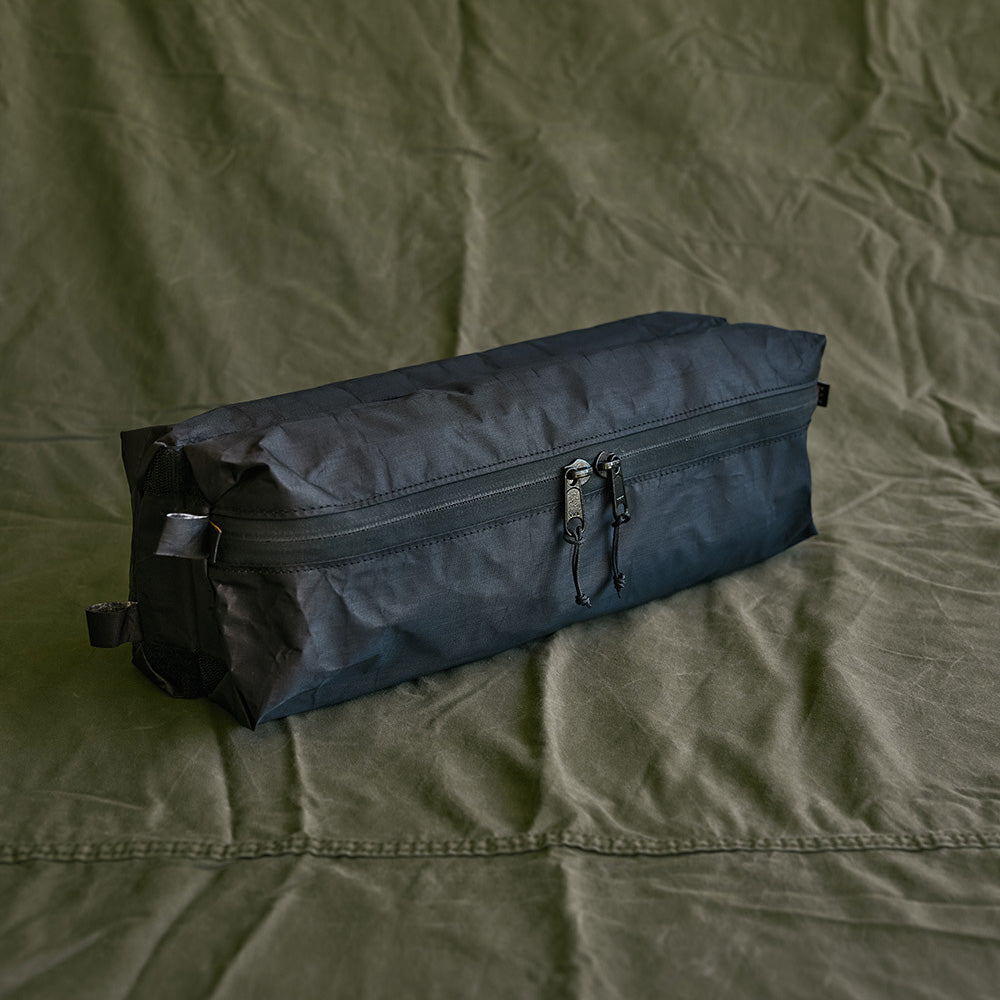 A Colfax Equipment Module UL pouch, zipped, on olive canvas