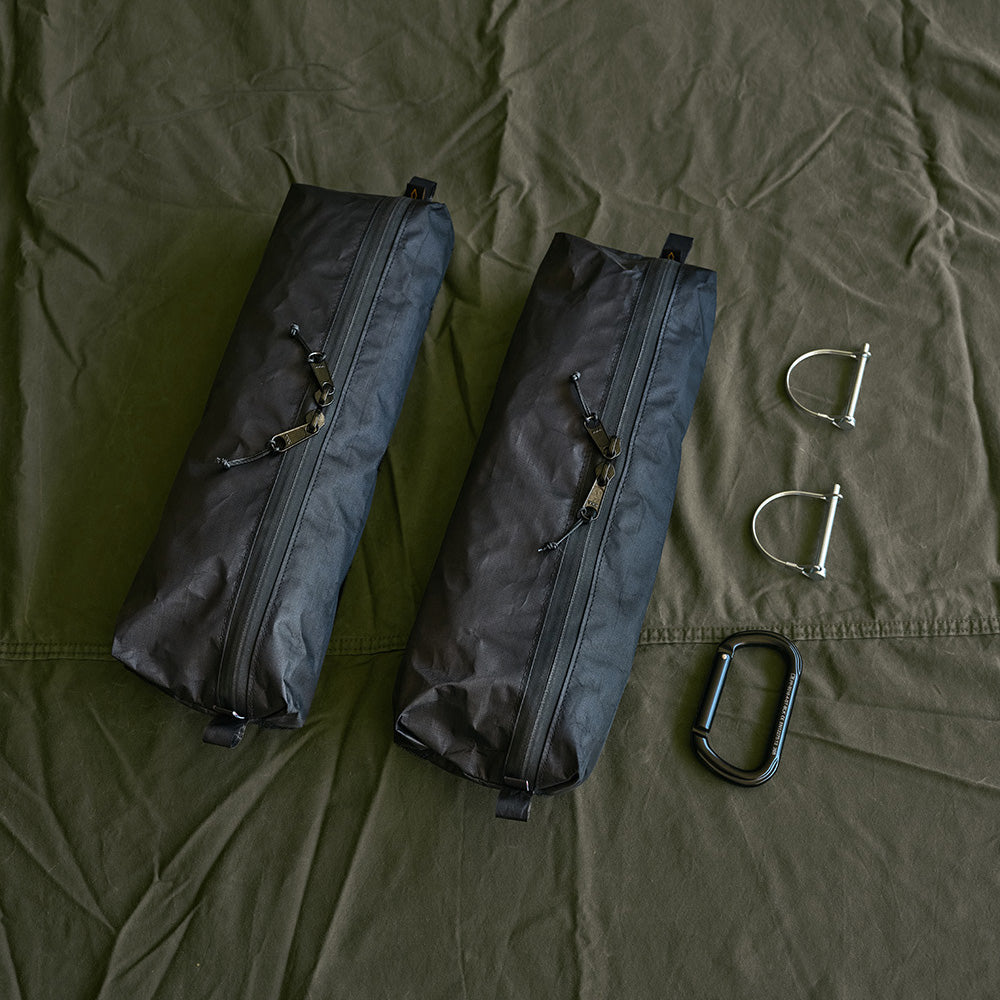 The two pouches separated, showing the hook and loop connection