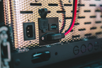 National Luna 35L dual zone fridge freezer, power and USB sockets close-up with cable plugged in, fridge on a slide