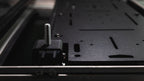 Adapt Plate holes and an antenna stud bracket on a crossbar
