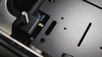 Adapt Plate beside an antenna bracket, close-up