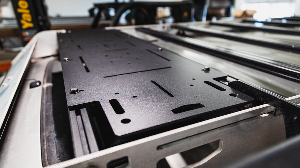 Long Adapt Plate on a rack in a shop