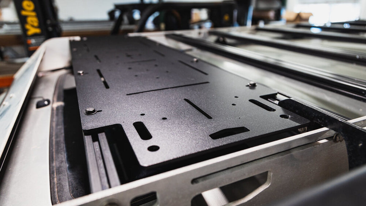 Long Adapt Plate on a rack in a shop