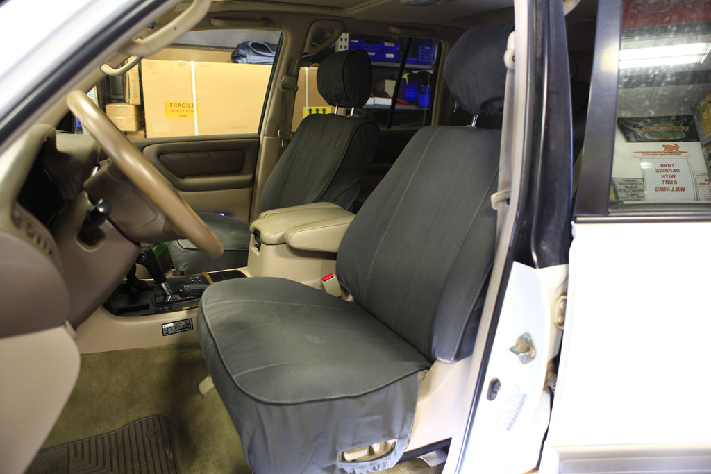Escape Gear canvas seat covers, Land Cruiser 100 Series, Grey front seats, driver side view through the open door