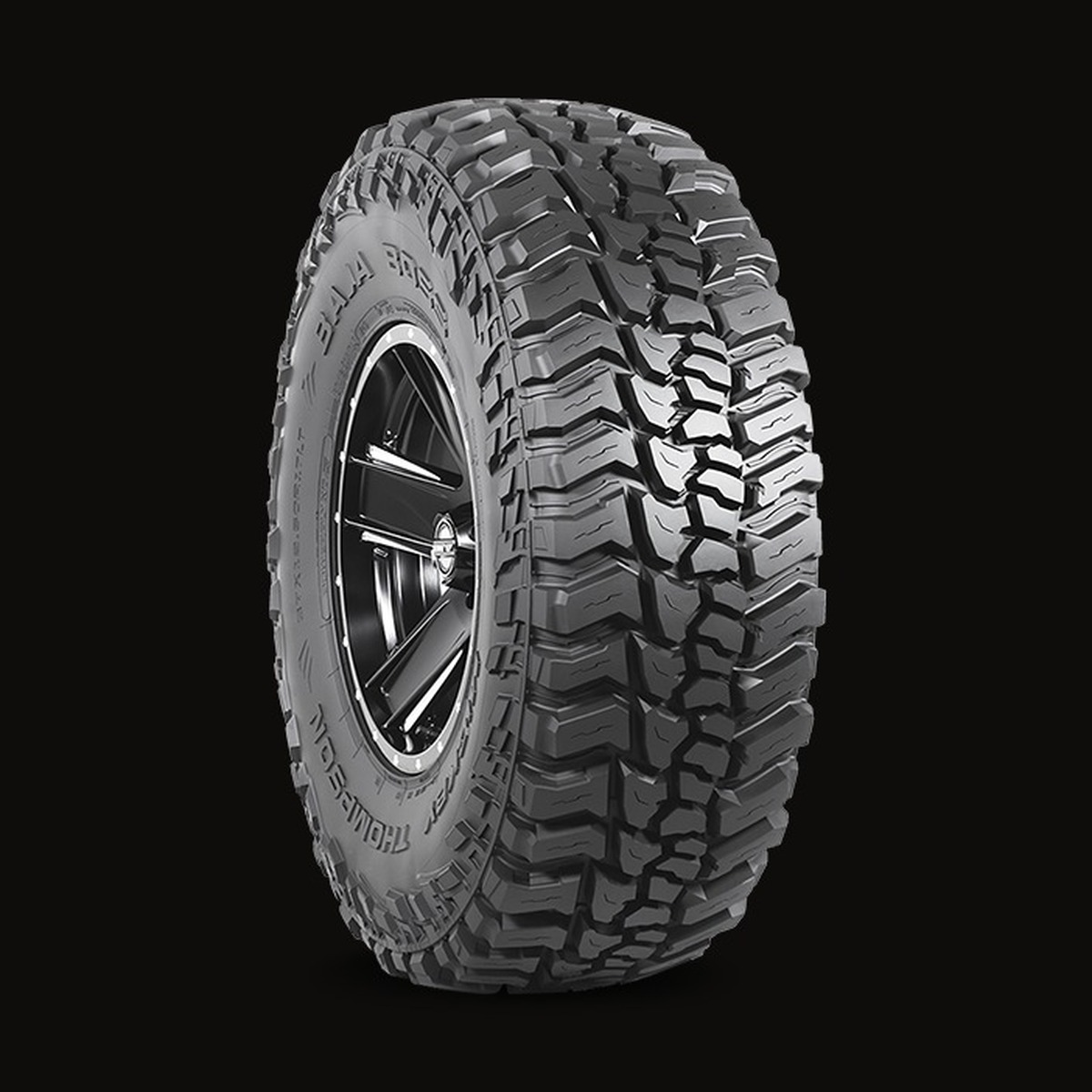 Baja Boss M/T in 37X12.50R17 mounted on a polished alloy wheel, three-quarter view