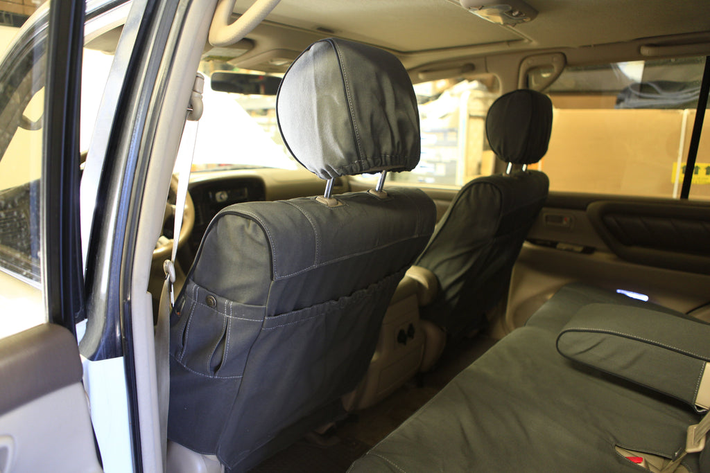 Escape Gear canvas seat covers, Land Cruiser 100 Series, Grey front seat backs with map pockets, from the rear door