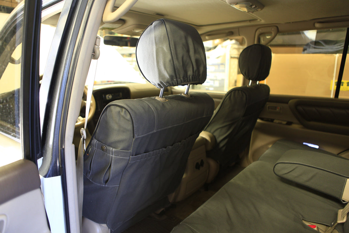 Escape Gear canvas seat covers, Land Cruiser 100 Series, Grey front seat backs with map pockets, from the rear door