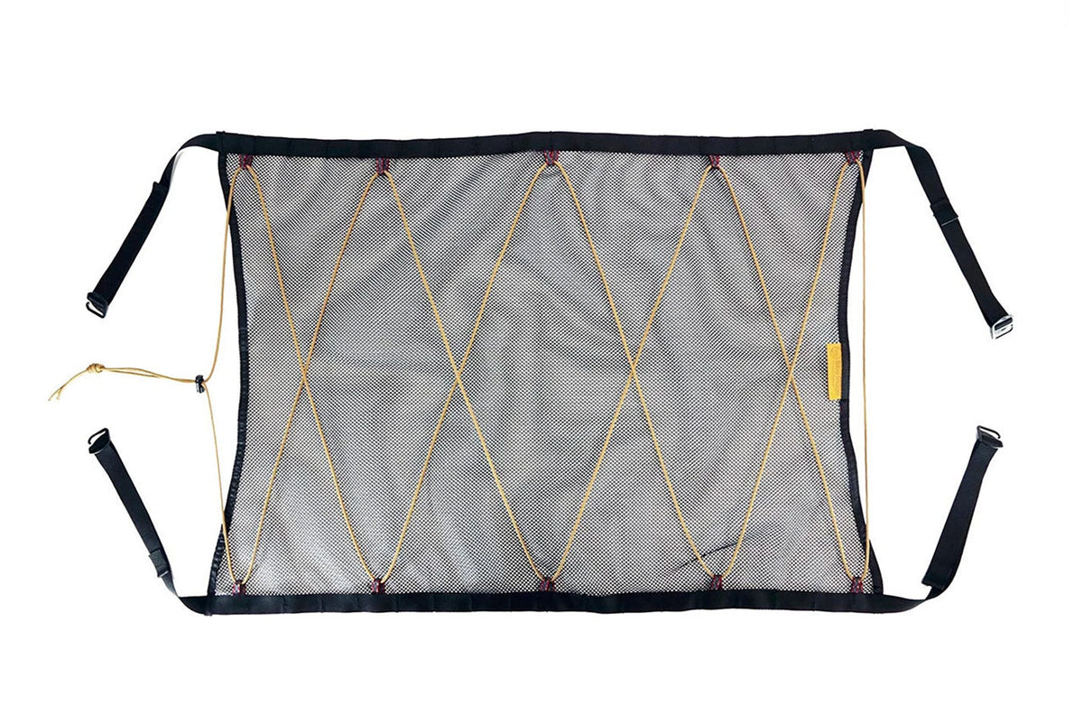 The Land Cruiser and LX attic laid flat: mesh, paracord lacing and four corner straps