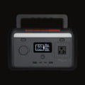 Sasquatch 300W power station, front view with the carry handle up and the screen lit