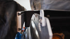 Sherpa awning mount installed on the side of a rack, holding an awning