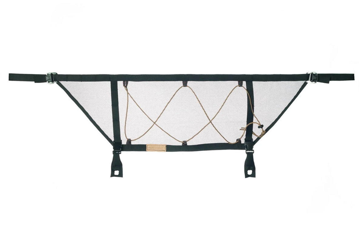 The Tacoma attic laid flat: a long, shallow mesh panel with webbing straps